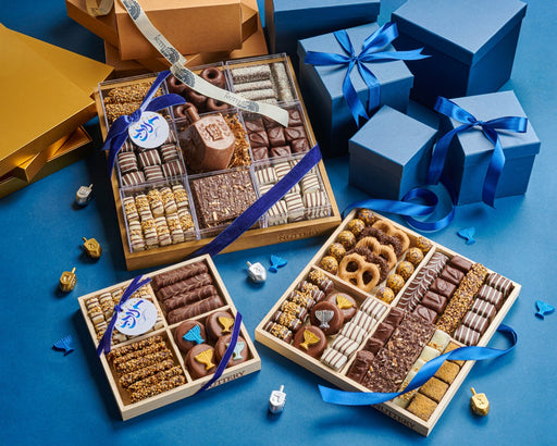 Luxurious Chanukah gift tray from The Nuttery NY, featuring a beautifully curated assortment of artisanal chocolates, chocolate-covered pretzels, and nut clusters, making it a perfect holiday present.