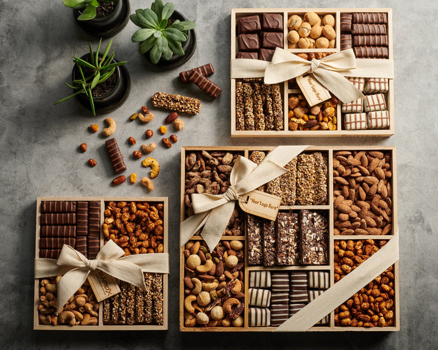 The Nuttery NY gourmet chocolate and nut gift trays in various sizes, elegantly arranged with an assortment of chocolate-covered treats, roasted nuts, and artisanal confections, wrapped with a custom ribbon