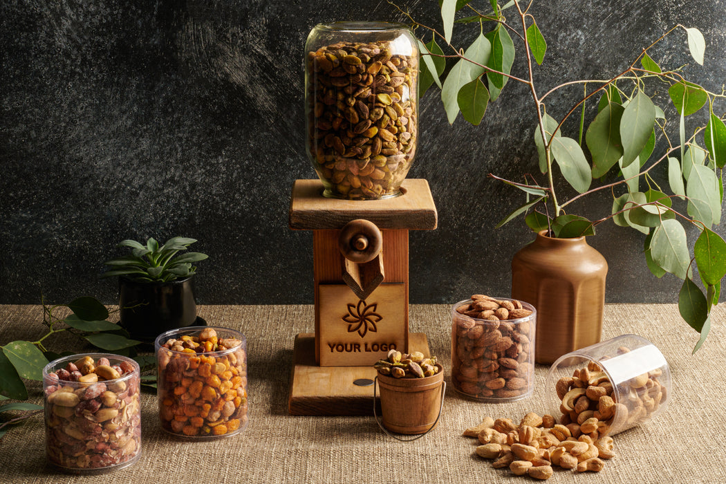 A sophisticated custom nut dispenser with refillable gourmet nuts, perfect for corporate gifting. Designed for style, convenience, and freshness.