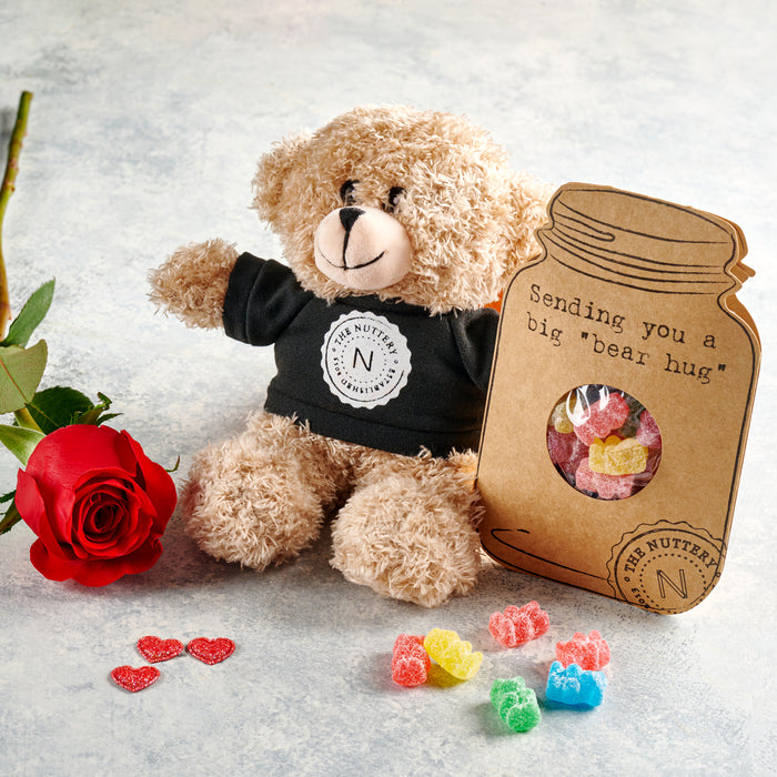 Nuts About You card with a jar-shaped design filled with roasted nuts, displayed alongside red hearts and a rose for a charming presentation.