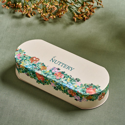 This elegant floral tin gift box is perfect for special occasions, featuring a botanical design that enhances its charm and appeal. Ideal for gifting high-end gourmet treats, this packaging adds a touch of refinement and beauty.