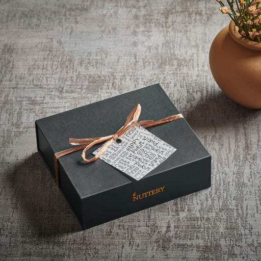 Elegantly wrapped and tied with a satin ribbon, this gourmet chocolate gift box is a stylish and delicious surprise. Ideal for holidays, birthdays, or corporate gifting, it delivers a premium sweet experience.