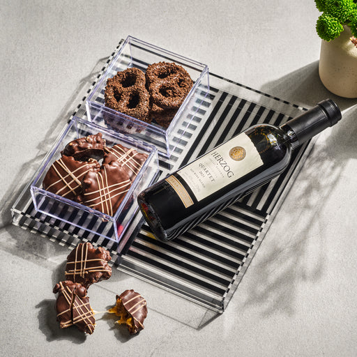 Share the joy of Purim with a beautifully packaged Shalach Manos gift, complete with premium chocolates and a fine bottle of wine. The perfect blend of tradition and indulgence.