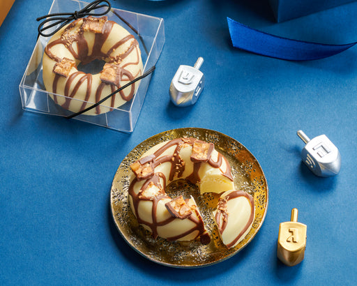 Take a bite into The Nuttery’s rich chocolate cheese donut, a decadent dessert with a creamy, indulgent filling. The perfect way to sweeten any celebration.
