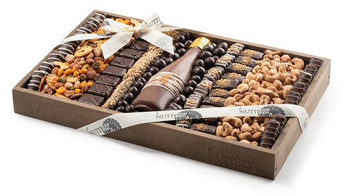 Up Close phot of Purim chocolate and nut gift tray, filled with premium sweets and roasted nuts