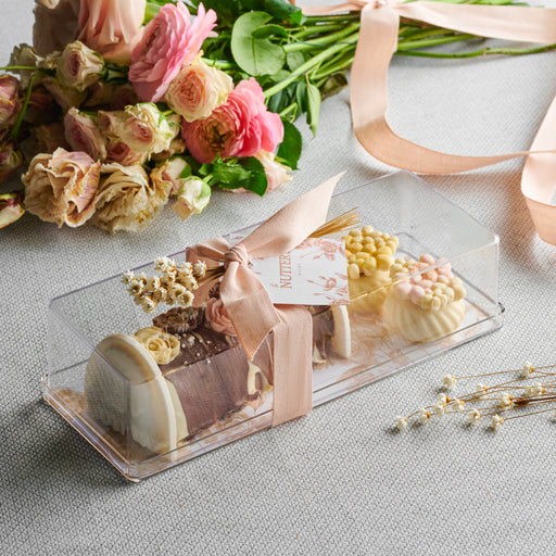 Celebrate Shavuos with the Floral Elegance Gift Tray, featuring handcrafted chocolates and gourmet confections, beautifully decorated with floral accents for a luxurious touch.