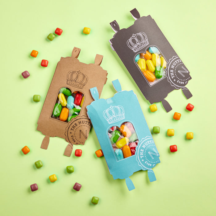 Candy-filled Torah card pouches featuring colorful Tribala candies, perfect for celebrations and events.