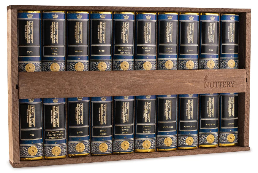 A luxurious chocolate gift set crafted to resemble a classic Shas collection. Encased in a wooden display, this unique creation blends tradition with gourmet indulgence.