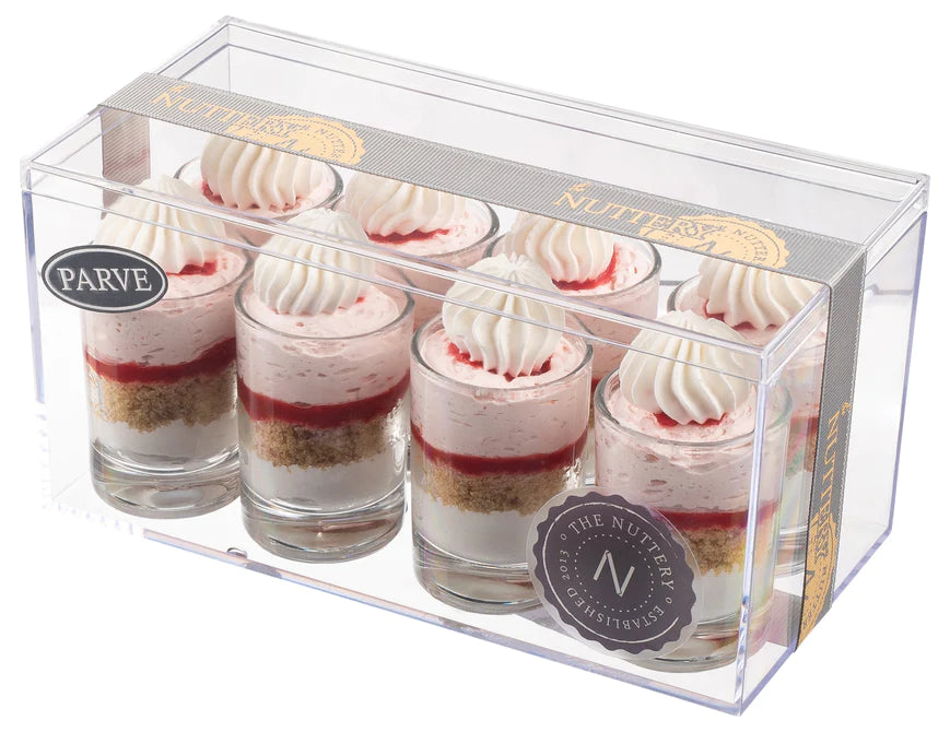 A set of six dessert glasses featuring layers of caramel mousse, chocolate ganache, and whipped topping, beautifully displayed in a clear gift box with The Nuttery branding