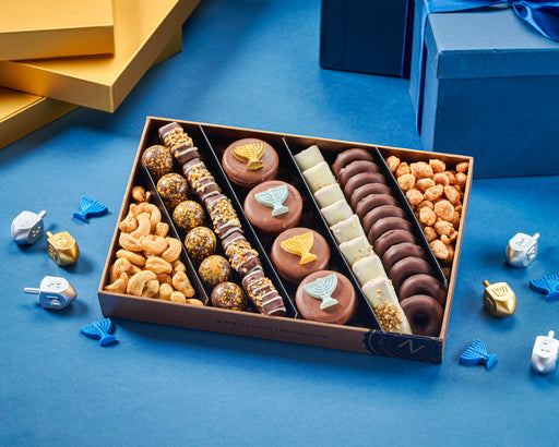 The Nuttery NY "Let's Celebrate Chanukah" Chocolate and Nut Tray, a festive assortment of gourmet chocolates, truffles, and nuts, beautifully arranged for Hanukkah gifting.