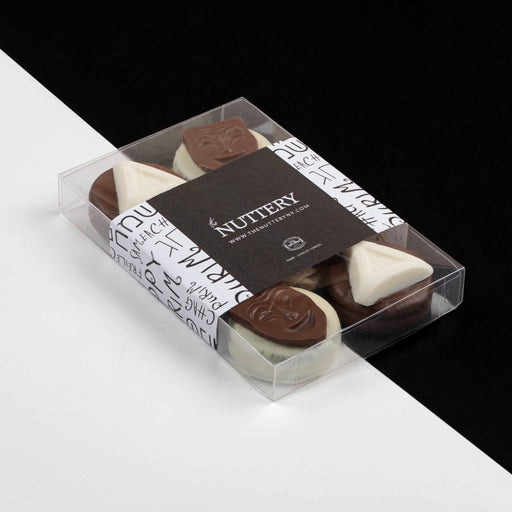 Handcrafted Purim-themed chocolate-dipped Oreos, decorated with iconic holiday symbols. A festive and delicious way to celebrate.