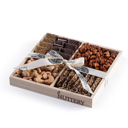 A compact yet indulgent chocolate and nut tray featuring hand-selected gourmet treats. With its elegant presentation, this is a thoughtful and delicious gift choice.