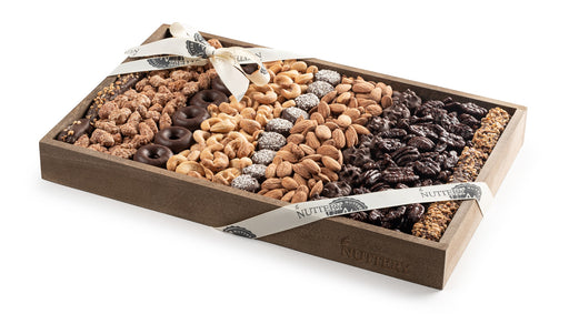 This Kosher for Passover Medium Size Chocolate and Nut Platter features a mix of roasted almonds, cashews, and chocolate-covered nuts, elegantly arranged for any occasion. Wrapped in a signature Nuttery ribbon, it’s a perfect gift for holidays or corporate events.