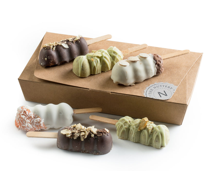 A delightful assortment of six chocolate-covered pops in a variety of flavors and coatings. Beautifully arranged in a gift box, these gourmet treats are perfect for any occasion.