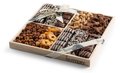 A generously sized chocolate and nut gift tray offering an exquisite mix of flavors and textures. Thoughtfully arranged and elegantly wrapped, this is a perfect gift for indulgence.