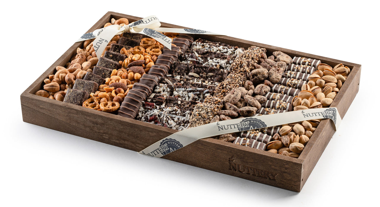 A balanced mix of handcrafted chocolates, roasted nuts, and gourmet treats in a stylish tray. This premium selection is designed for both gifting and personal enjoyment.