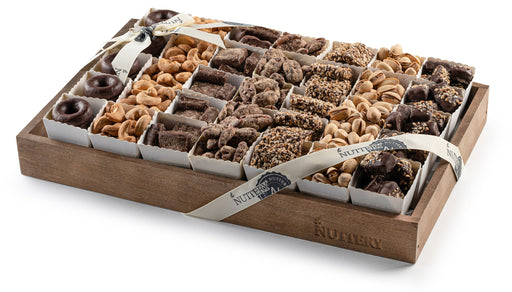 Delight in a beautifully curated assortment of The Nuttery’s chocolates and nuts, served in elegant party cups. A sophisticated centerpiece for gatherings and special occasions.