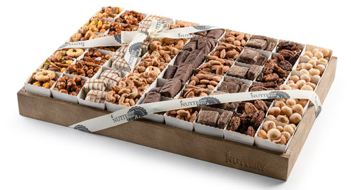 Indulge in a gourmet selection of premium chocolates, crunchy nuts, and decadent halva with this beautifully arranged gift tray. Perfect for any occasion, this medium-sized tray is packed with rich flavors and textures that will satisfy every craving.