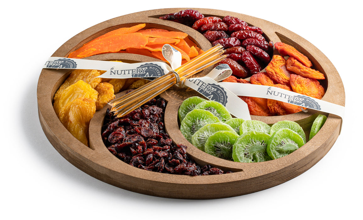 The Nuttery Shana Tova Large Swirl Tray is a stunning arrangement of premium chocolates and dried fruits, artfully displayed in a handcrafted wooden tray. Featuring chocolate-covered treats, sweet dried fruits, and nutty confections, this elegant gift is perfect for celebrating Rosh Hashanah with family and friends.
