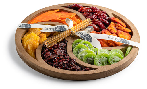 The Nuttery Shana Tova Large Swirl Tray is a stunning arrangement of premium chocolates and dried fruits, artfully displayed in a handcrafted wooden tray. Featuring chocolate-covered treats, sweet dried fruits, and nutty confections, this elegant gift is perfect for celebrating Rosh Hashanah with family and friends.