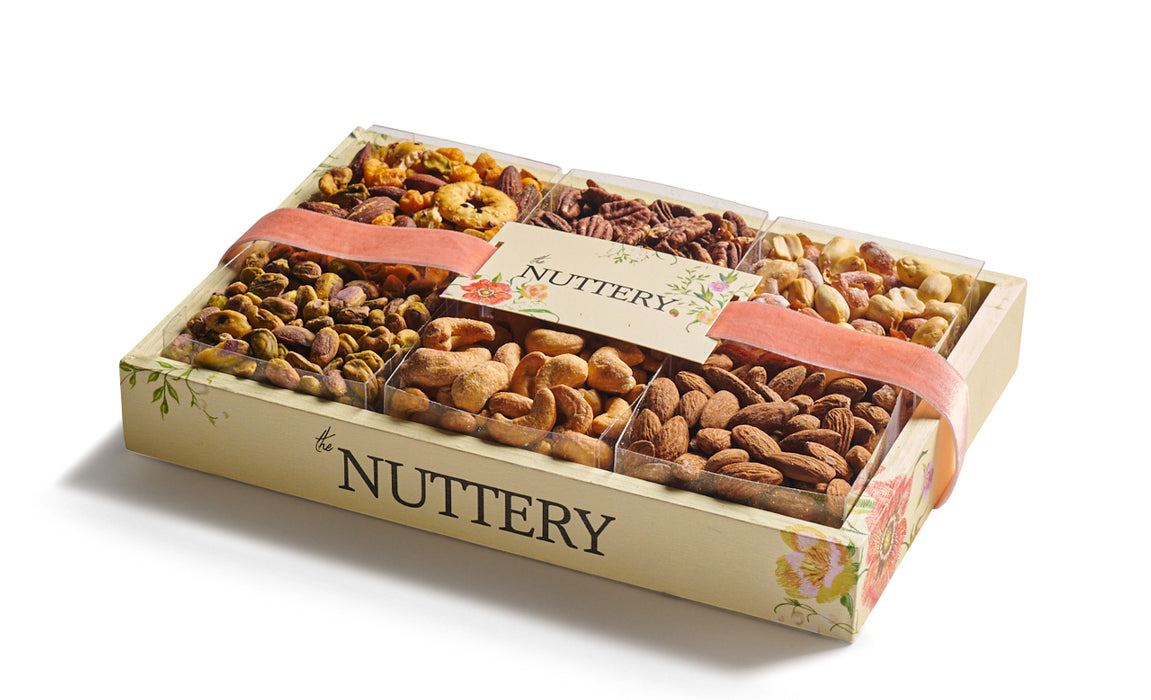 Gourmet nut floral gift tray from The Nuttery NY, featuring a premium assortment of roasted and salted nuts, including almonds, cashews, pistachios, and pecans, elegantly packaged with a decorative ribbon.