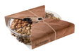 A beautifully arranged selection of gourmet pistachios in a six-section plastic tray, offering a mix of flavors and textures. A thoughtful gift choice for any pistachio enthusiast.